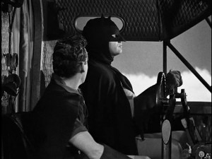 Batman piloting a plane